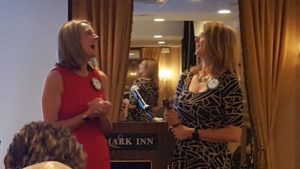 Amanda Filizetti and Lucy Grove speaking at Amanda's last meeting as Marquette West Rotary President.